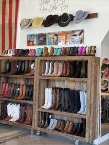 Kimes Ranch pop-up in Rice Village for Rodeo wear - boots and hats