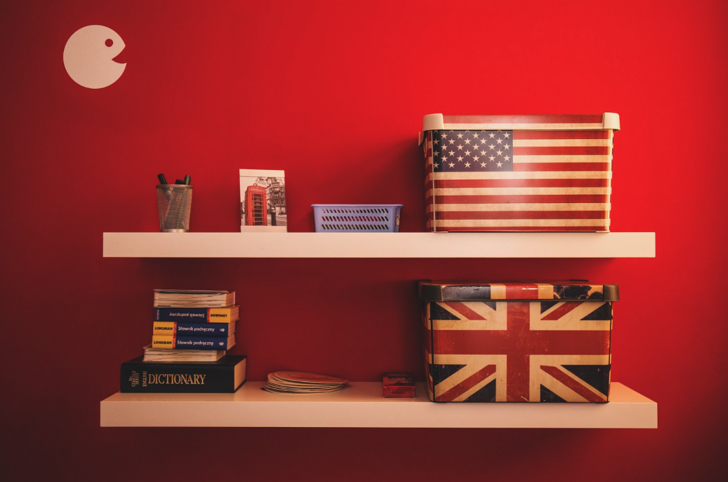 Shelves with boxes bearing UK and US flags