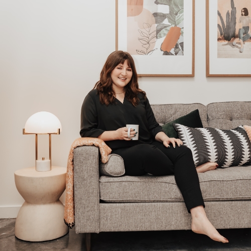 Lodgeur guest sitting on a sofa
