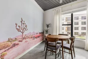 Dining area and mural in a furnished apartment