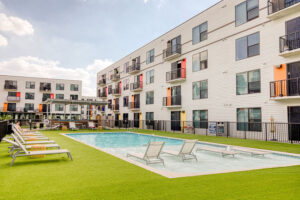 Pool and sun loungers at Lodgeur at Mid Main Lofts