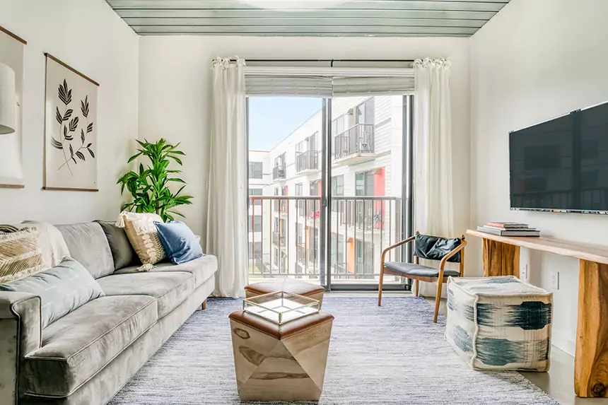 Living room of a Lodgeur short-term furnished rental apartment in Houston, Texas.