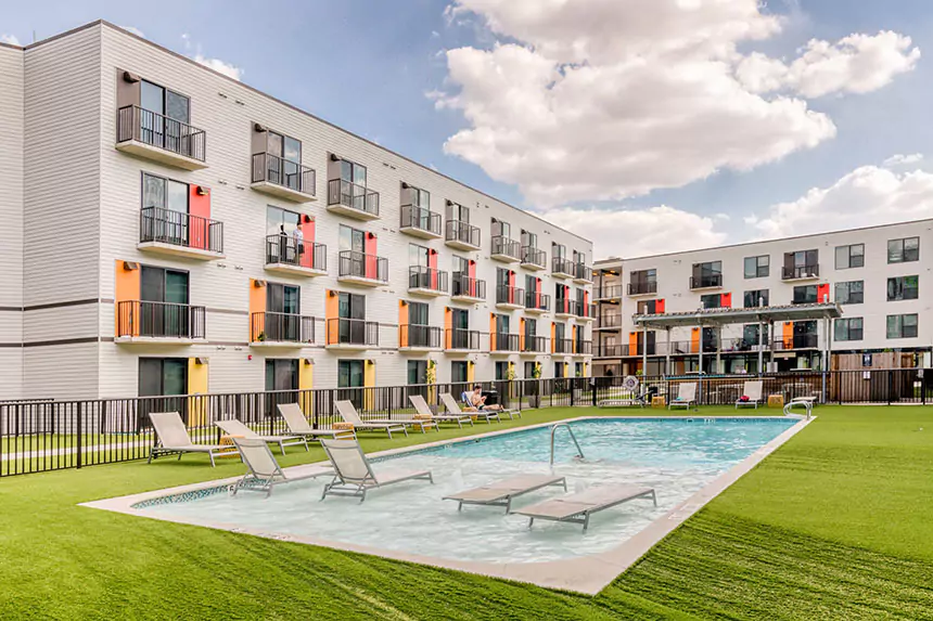 Pool and sun loungers at Lodgeur at Mid Main Lofts