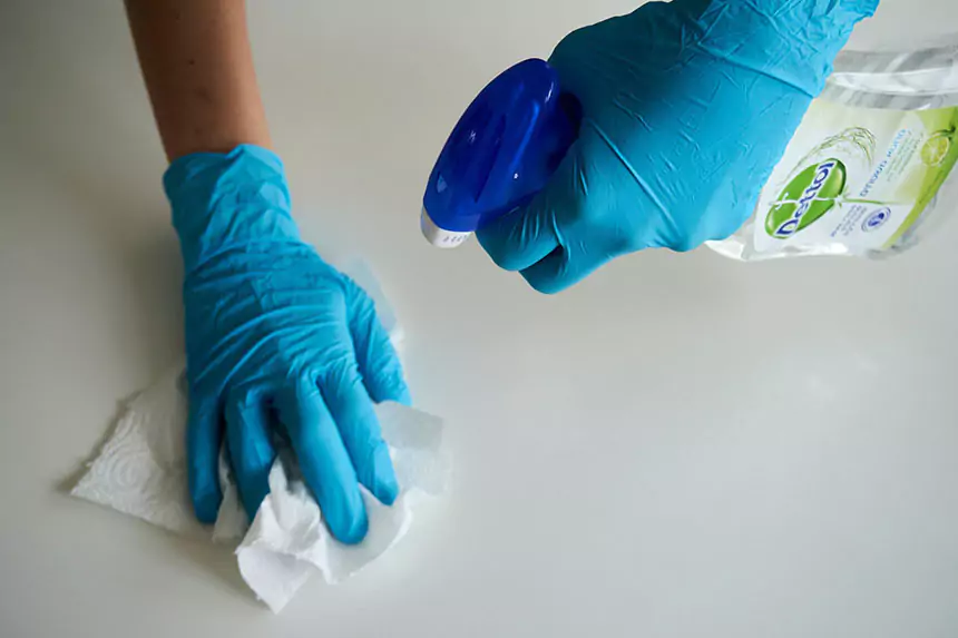 hands with gloves cleaning