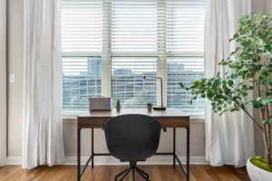 Desk and chair in a Lodgeur short-term furnished rental apartment in Houston, Texas.