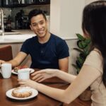 couple with coffee in a Medical Center furnished apartment by Lodgeur