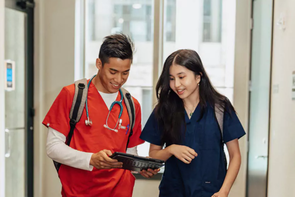 Healthcare travelers in scrubs at the Texas Medical Center