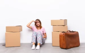 woman with boxes and luggage