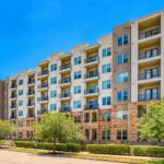 Exterior shot of the Lodgeur at Elan Med Center apartment community