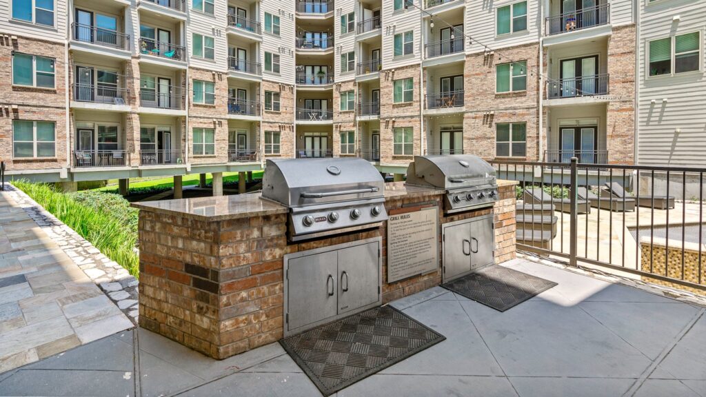 Communal BBQ grills outside for residents of Lodgeur at Elan Med Center