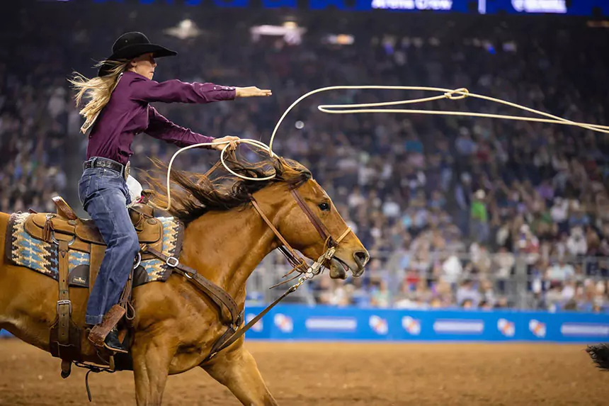 woman on horseback at the rodeo