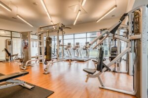 Strength equipment at the Mid Main Lofts fitness center open 24/7