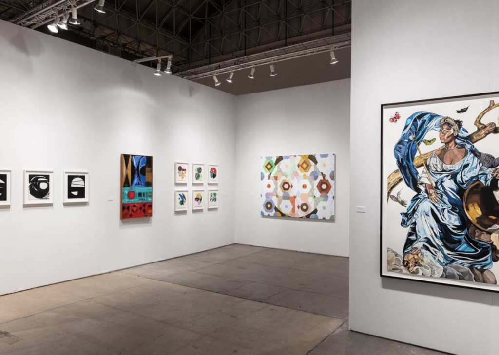 An art gallery showcasing beautiful paintings on its walls.