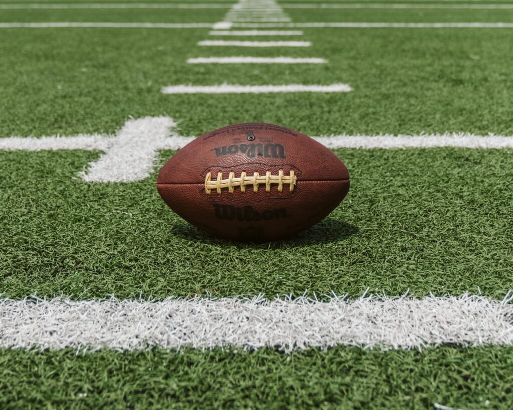football on an American football field
