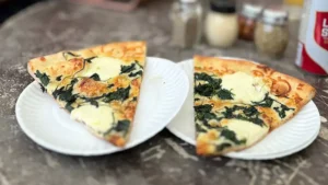 spinach and ricotta pizza by the slice at Austin-based Home Slice Pizza