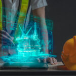 Engineer looking at the plan of an oil rig in the middle of the sea to plan maintenance