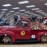 A red truck filled with plushies at Bucc-ee's