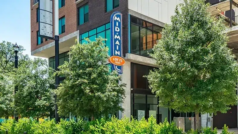 The exterior of the Mid Main Lofts apartment community in Houston's Midtown neighborhood