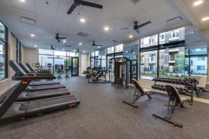The gym at Lodgeur Energy Corridor with cardio and strength equipment